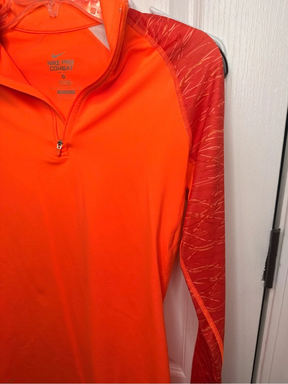 Nike Women’s Long-Sleeve Quarter-Zip Performance pullover- Neon Orange